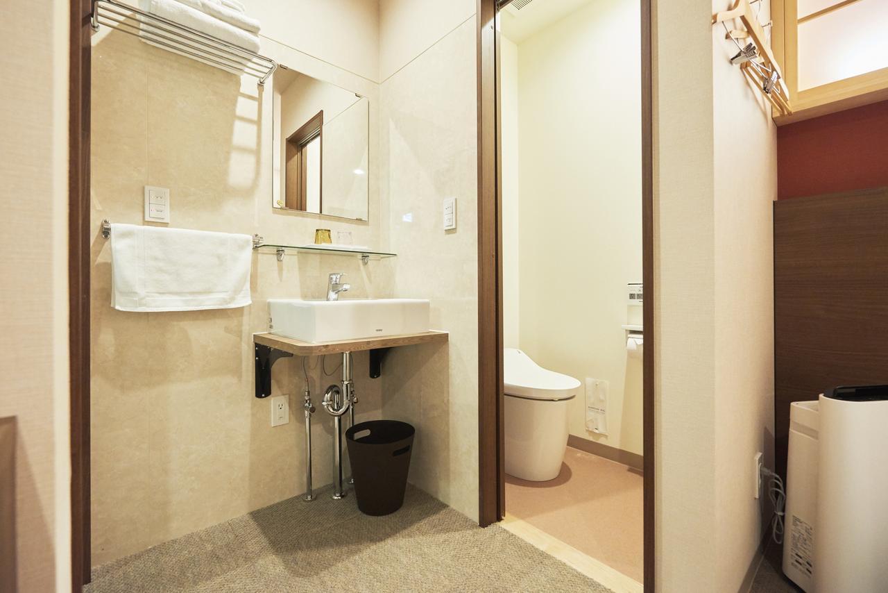 Hotel Kan Raku Honjo Waseda Ekimae Bagian luar foto